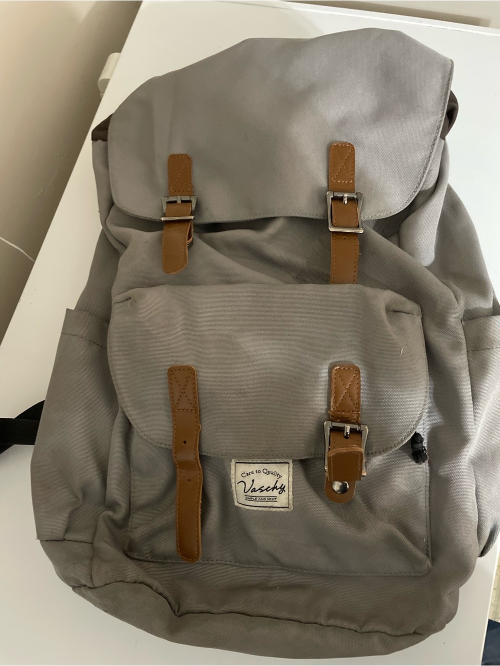 Gray Canvas Backpack with Brown Trim